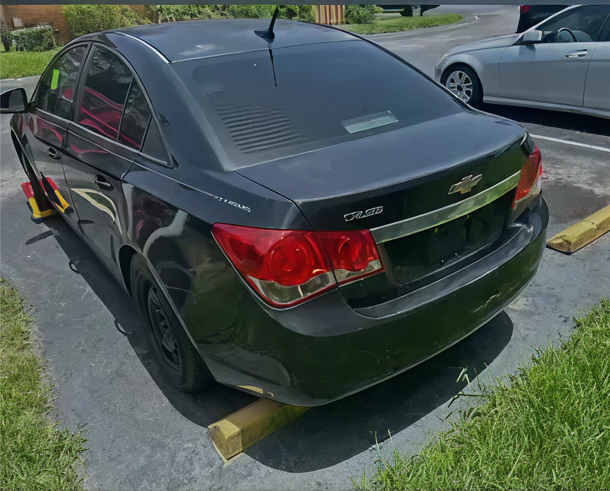 Sedan secured with wheel blocks