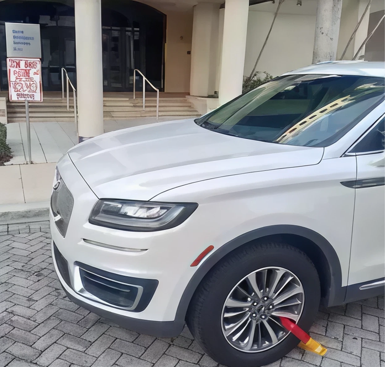 Car parked in front of building